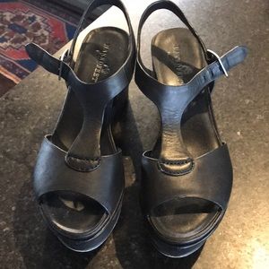 Black leather wedge shoes